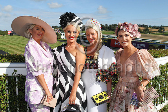 Catherine O'Connor from Camlough, Shileen McConville from Lurgan, Sinead McKenna from County Meath and Victoria Lavery from Lurgan at Ladies Day at Downpatrick Racecourse on Monday