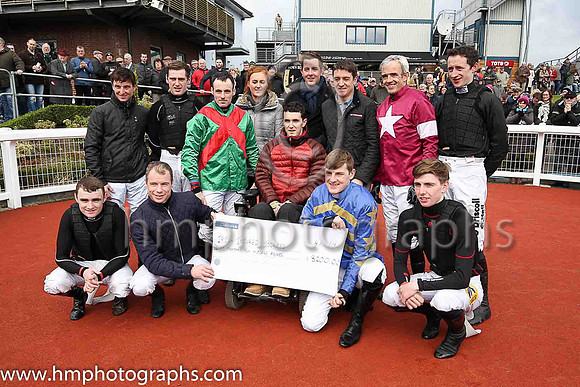 Presentation by Jonjo Bright, Reah Magee and Robert Carlise of East Antrim Hunt to the Irish Injured Jockeys Fund at Down Royal.