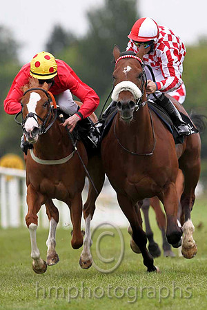 R5 Atlantic Cycle Red  & Yellow spotted hat, Rider D P McDonagh wins at Down Royal Race Course, Big Typhoon (1) Red Stripes is second, Rider B A Curtis- FT8E0522-e